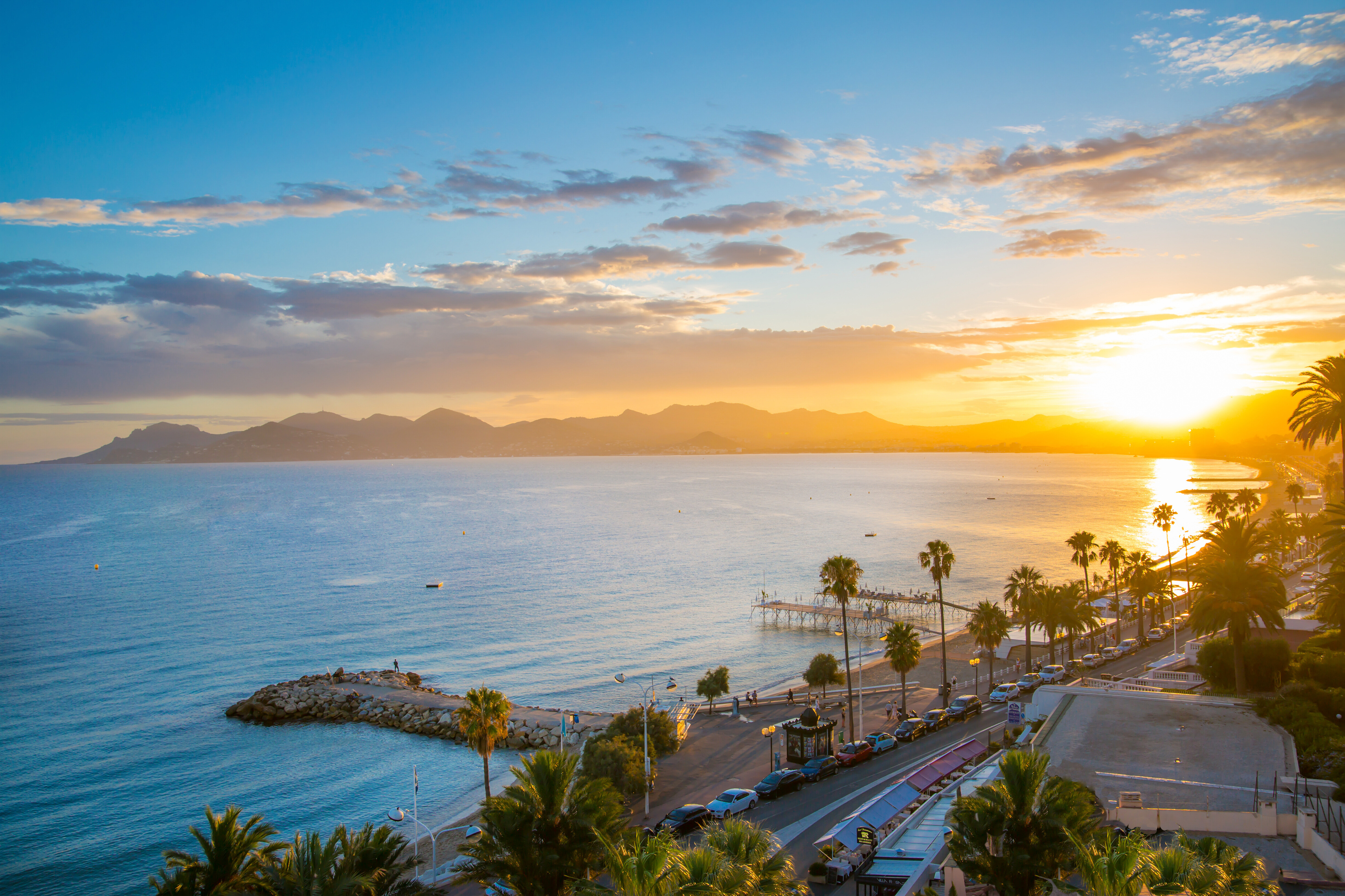 Cannes Bay Beach Sunset Framed by Mountain Views
