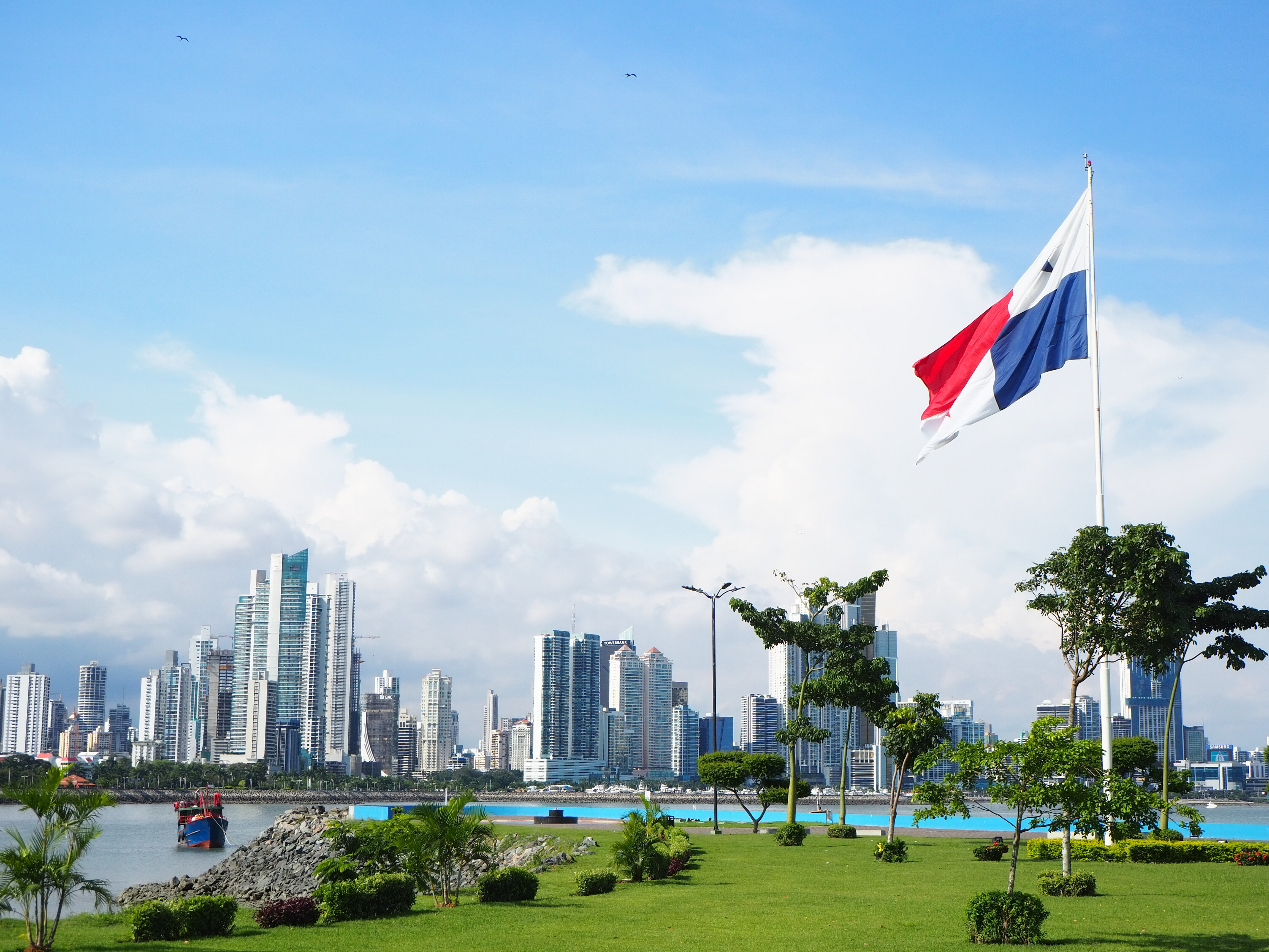 Tamarindo cityscape with a national flag, showcasing the vibrant coastal town
