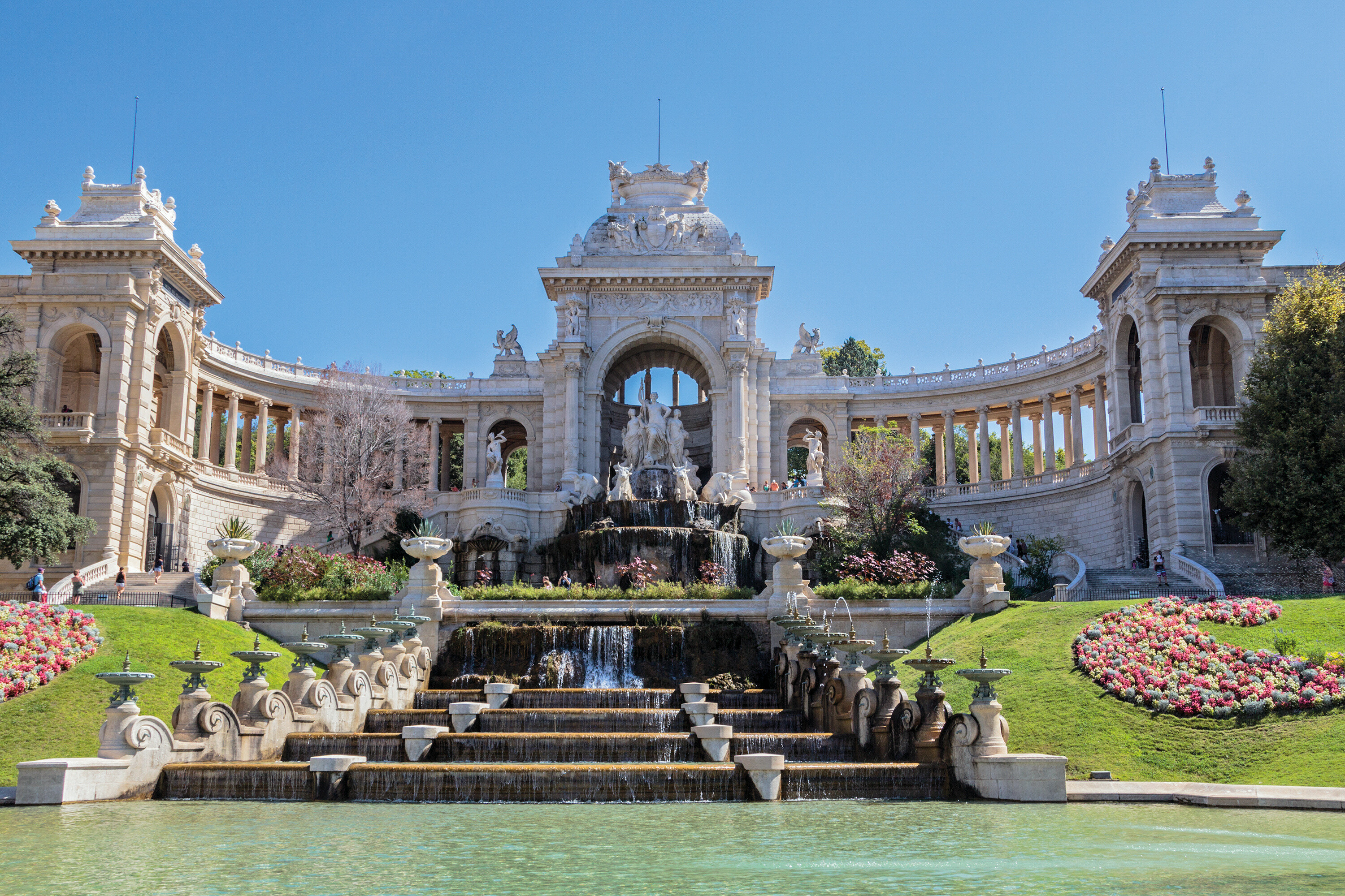 Palais Longchamp Showcasing Grand Fountains, Sculptures, and Elegant Facade