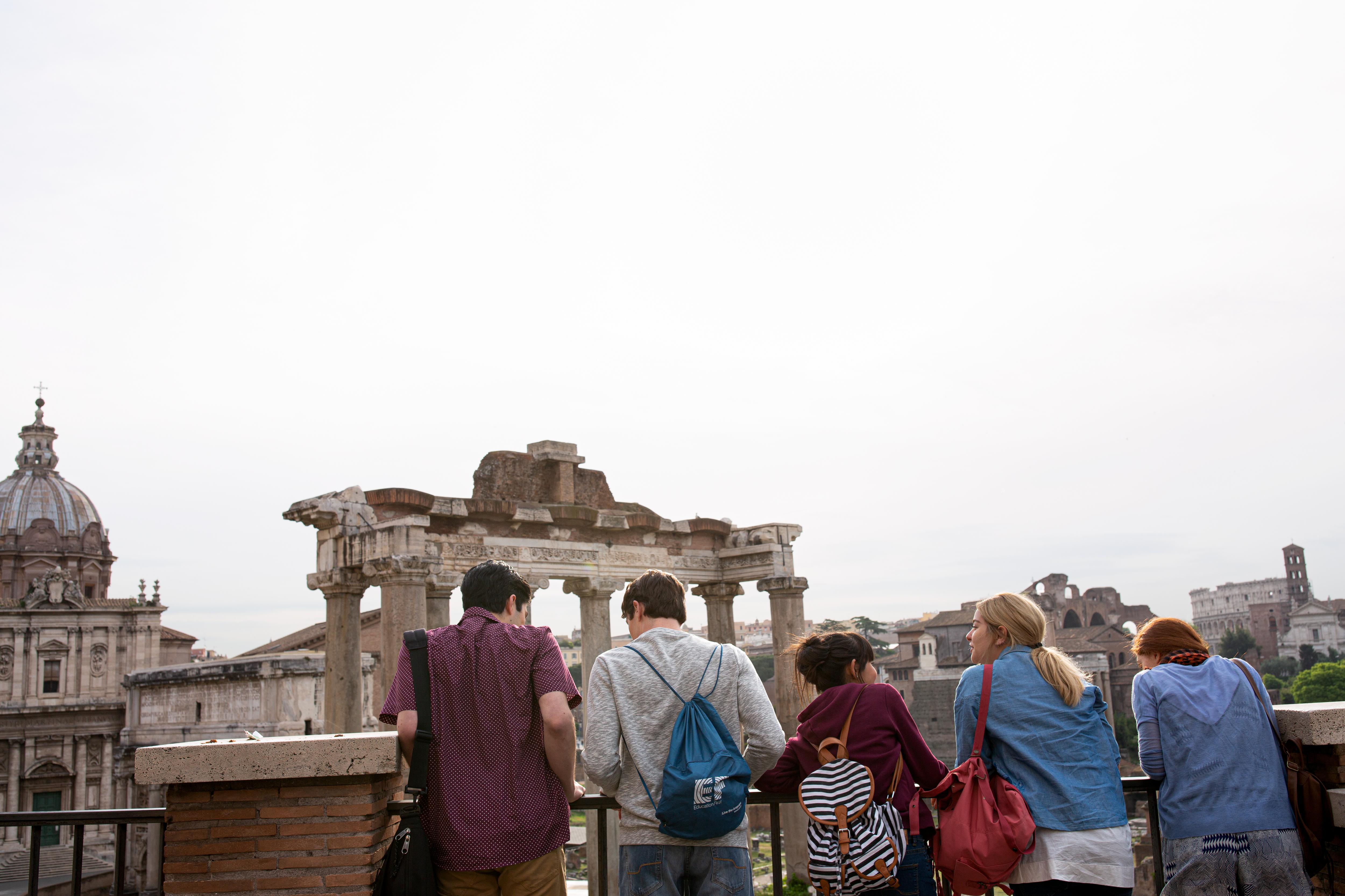 Students explore the ruins of ancient Rome from a scenic viewpoint, experiencing history, culture, and iconic landmarks