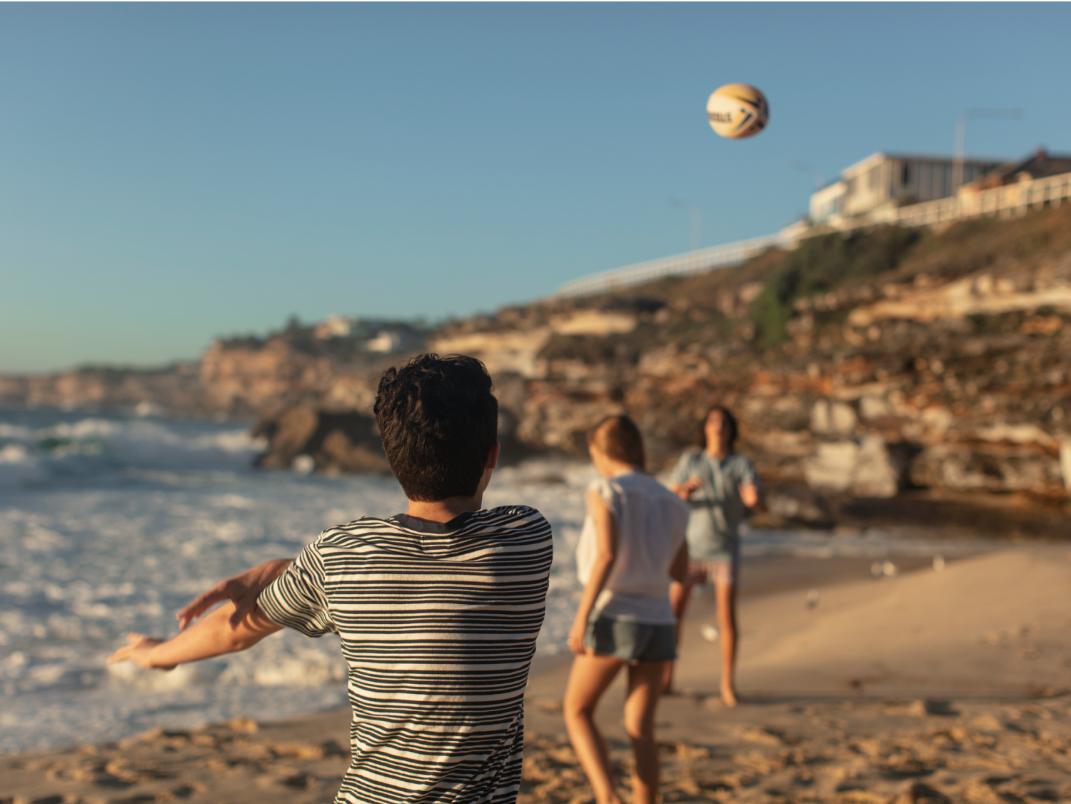Students Playing Near Beach