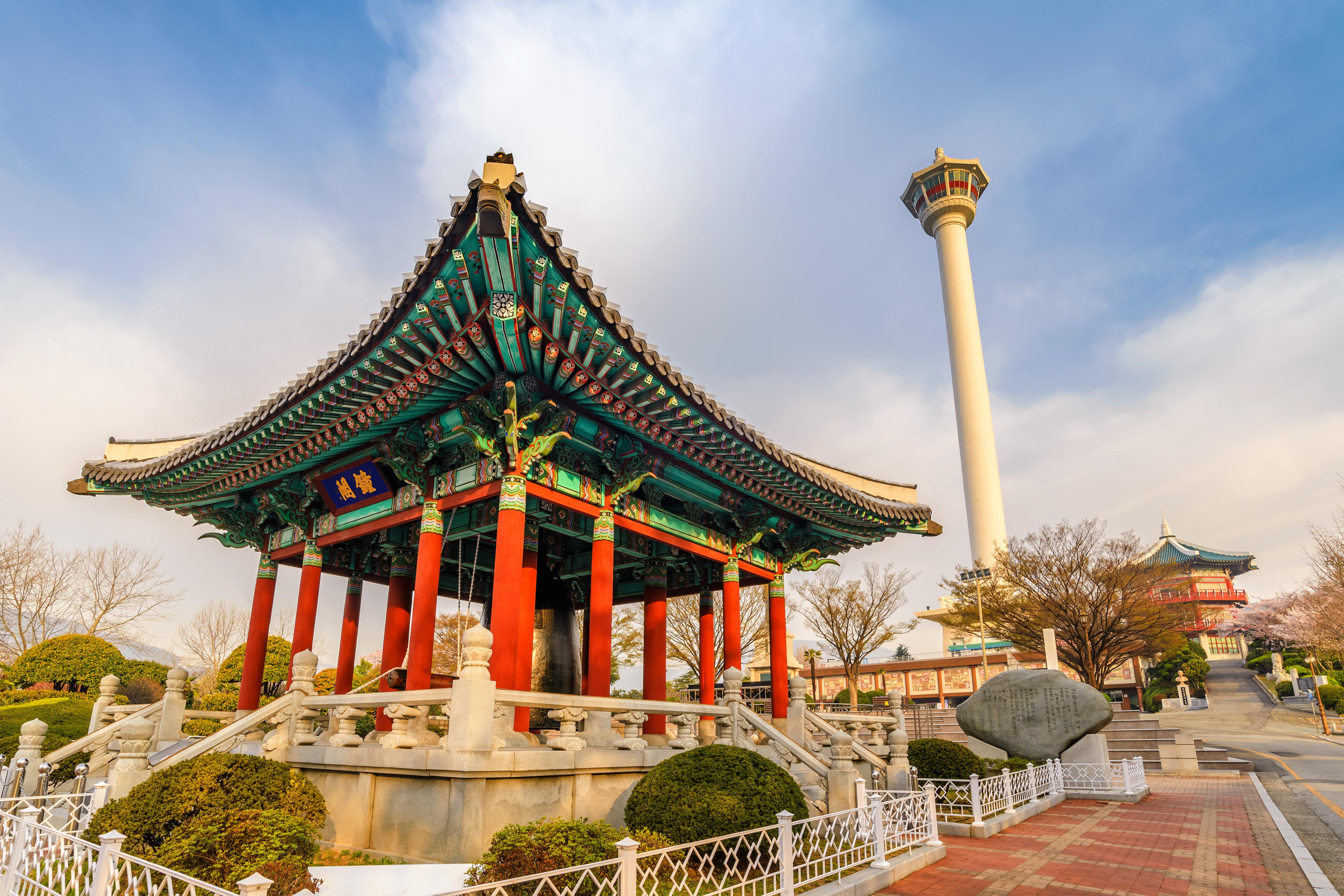 Yongdusan Park Bell Pavilion and Busan Tower Under Sunny Skies