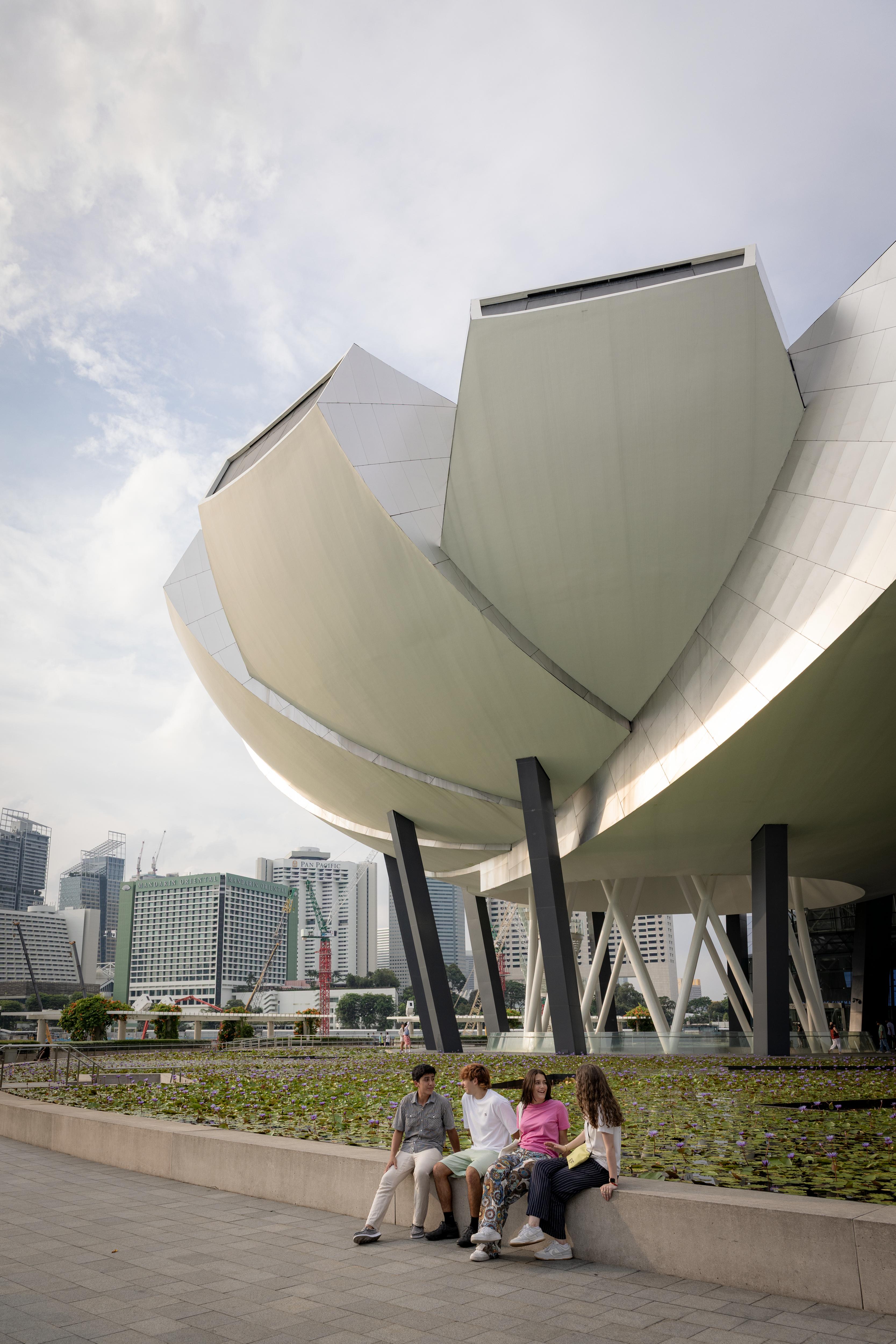 Students at Singapore’s ArtScience Museum, enjoying views of the iconic lotus-shaped landmark