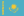 This is the flag of Kazakhstan, which features a turquoise background, a golden sun with 32 rays above a soaring golden eagle, and a traditional ornamental pattern known as "koshkar-muiz" or ram