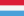 The flag of Luxembourg features three horizontal stripes in red, white, and light blue. It is one of only three flags in the world with this color combination.
