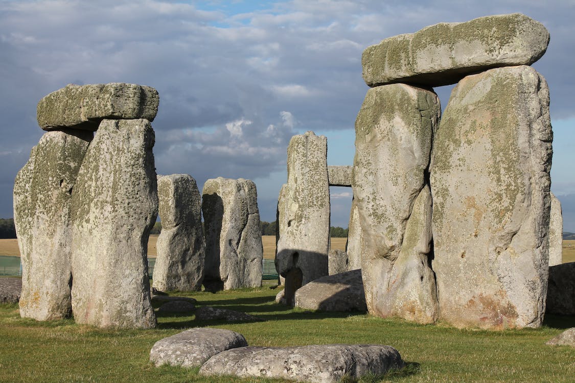 Stonehenge is a prehistoric monument in Wiltshire, England, consisting of a ring of standing stones, each around 13 feet high, seven feet wide, and weighing around 25 tons.