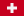 The image displays the flag of Switzerland, a red flag featuring a white cross at its center. It symbolizes Switzerland and its neutrality.