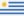This is the flag of Uruguay. It features nine equal horizontal bands of white and blue, with the Sun of May in the upper hoist-side canton.