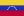 This is the flag of Venezuela, which consists of three equal horizontal bands of yellow, blue, and red, with a white arc of stars in the center of the blue band.